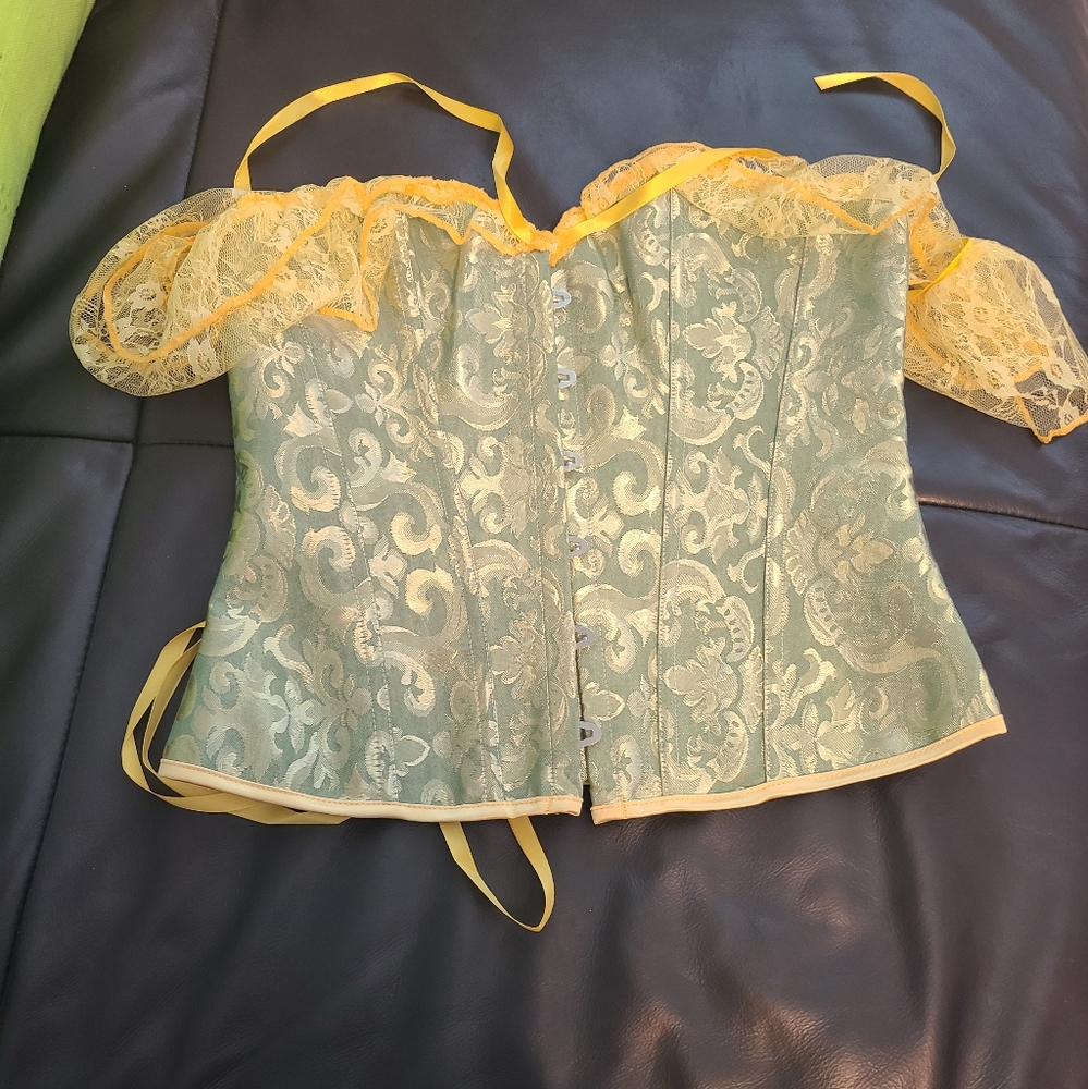 Green corset with  yellow  lace sleeves.  Size L NWT